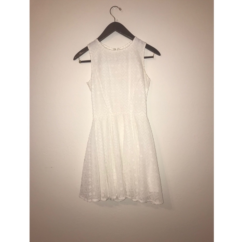 Barely worn white elegant dress from Macys.